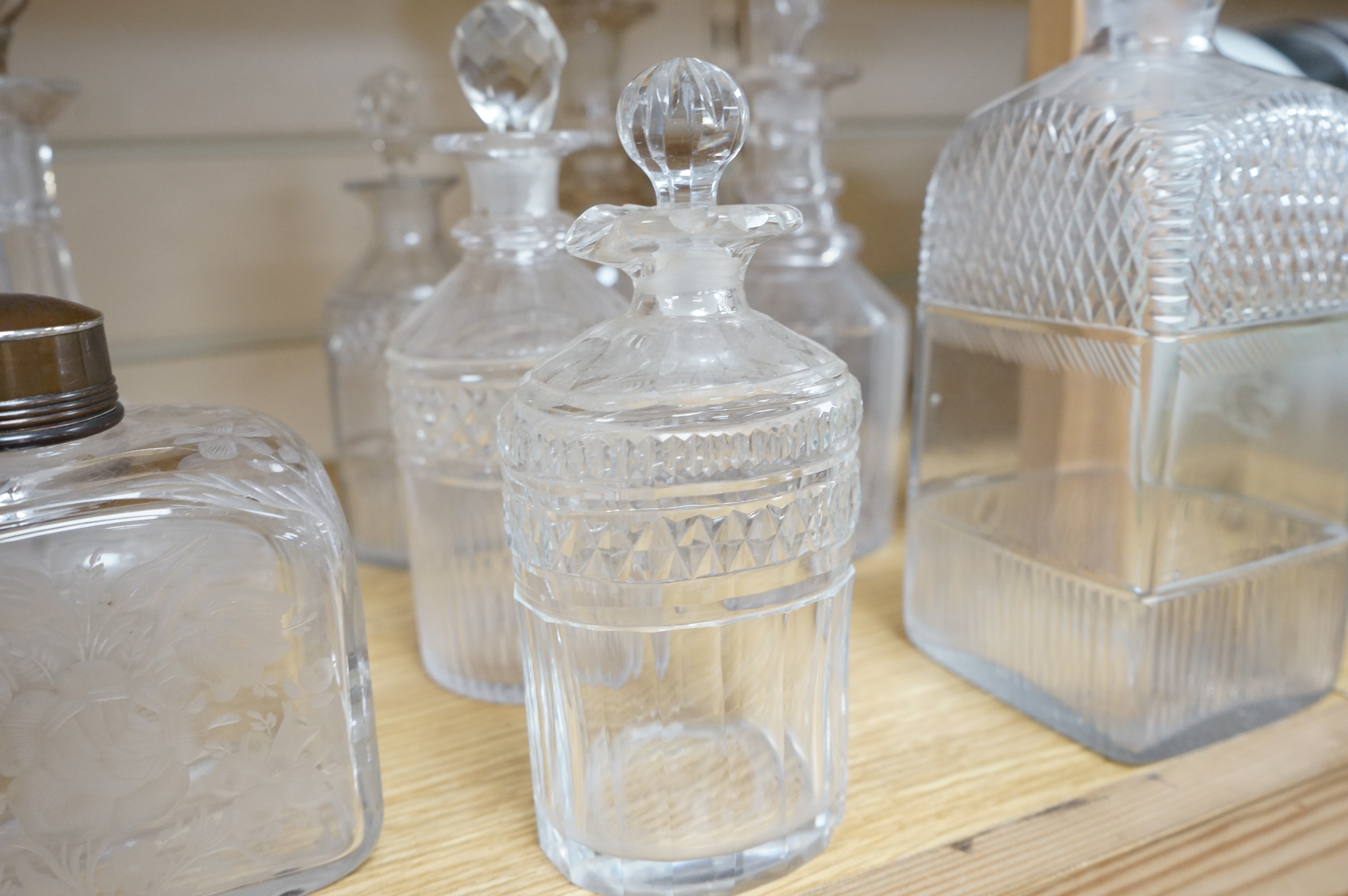 A collection of assorted drinking glassware including sets of decanters and a large etched glass goblet, largest 27cm high